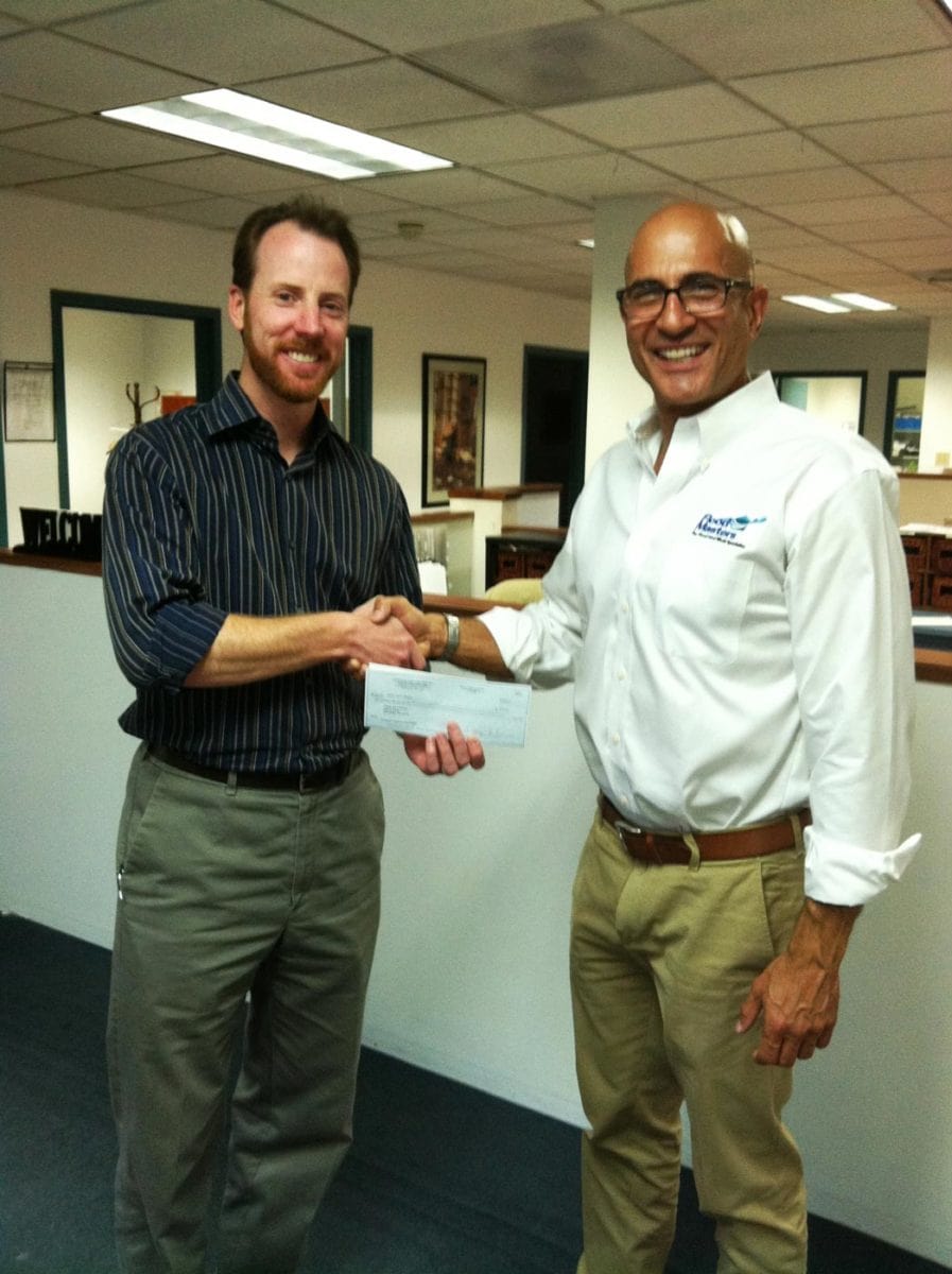 George Fahouris presents Bill Bolstad, VP of Capital Development at Father Joe's Villages, with a donation from Flood Masters. We proudly sponsor this great organization and support them in their efforts to help those less fortunate.